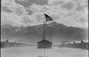 Manzanar, California. Dust storm at this War Relocation Authority center where evacuees of Japanese ancestry are spending the duration.