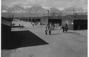 Panoramic view of students walking around the Manzanar Relocation Center in California in the 1940s.