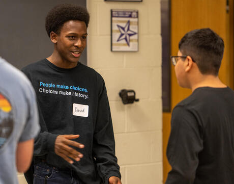 Picture of students talking at the Democracy in Action Community Teach-in, 2022.