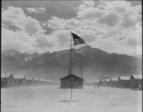 Manzanar, California. Dust storm at this War Relocation Authority center where evacuees of Japanese ancestry are spending the duration.